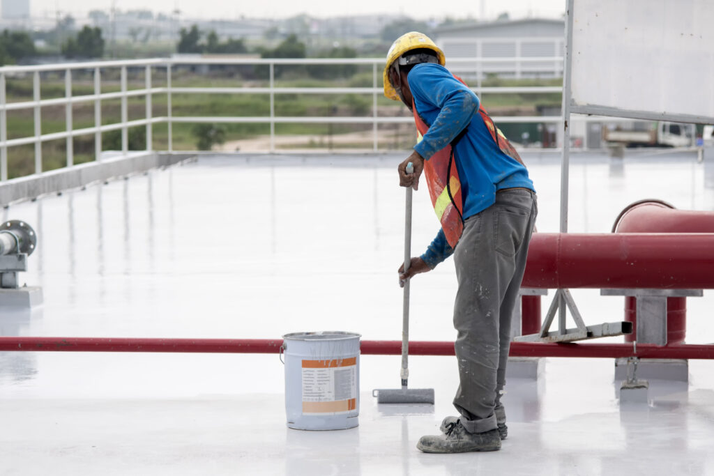 The current image has no alternative text. The file name is: construction-worker-coating-epoxy-paint-roof-slab-water-proof-protection-scaled.jpg